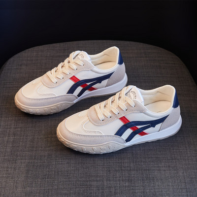 Ženske tenisice jednobojni model s rubovima i vezicama