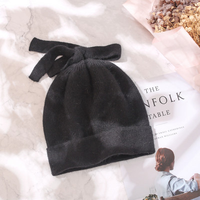 Ženska debela vunena kapa sa trakom