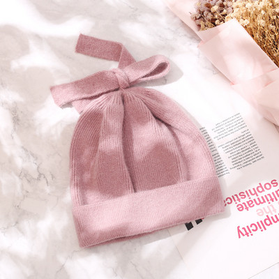 Ženska debela vunena kapa sa trakom