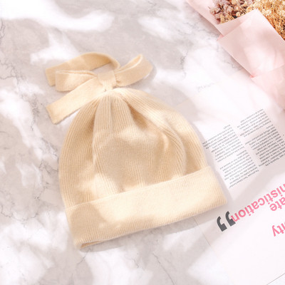 Ženska debela vunena kapa sa trakom