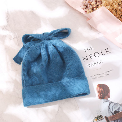 Ženska debela vunena kapa sa trakom