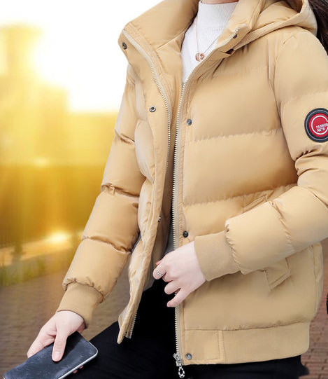 Napi női téli kabát emblémával