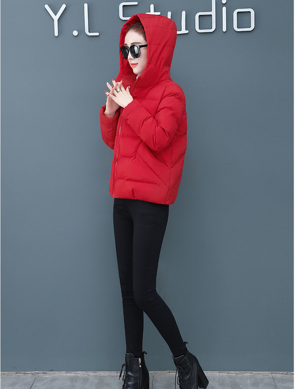 Női modern kabát sima modell cipzárral és kapucnival