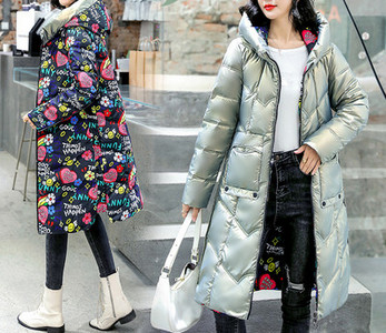 Kétsoros női kabát zsebekkel és cipzárral