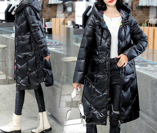 Kétsoros női kabát zsebekkel és cipzárral