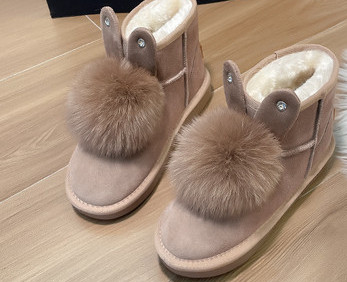 Női téli csizma meleg béléssel és pehellyel