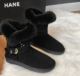 Alkalmi női csizma csattal és pehellyel