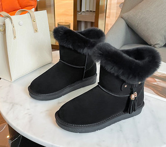 Alkalmi női csizma csattal és pehellyel