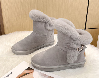 Alkalmi női csizma csattal és pehellyel