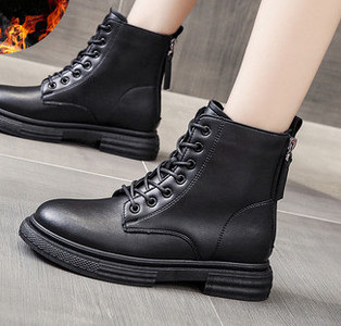 Naiste musta värvi paelte ja lukuga nahast saapad