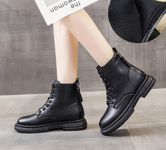 Naiste musta värvi paelte ja lukuga nahast saapad