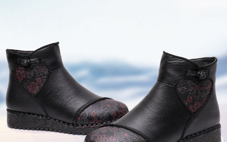 Lameda talla ja tikitud lilledega naiste saapad