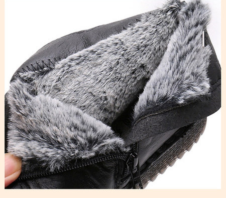 Lameda talla ja tikitud lilledega naiste saapad