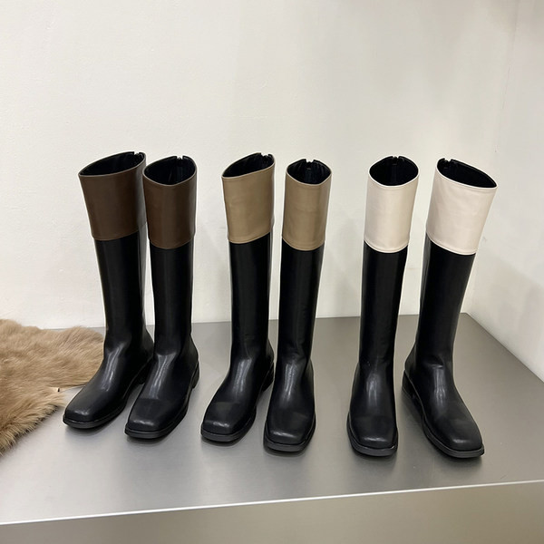 Naiste musta värvi kunstnahast saapad