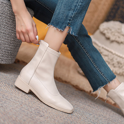 Naiste ühevärviliste kunstnahast saapade uus mudel