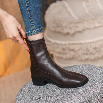 Naiste ühevärviliste kunstnahast saapade uus mudel