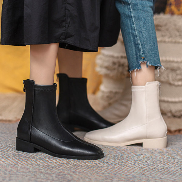 Naiste ühevärviliste kunstnahast saapade uus mudel