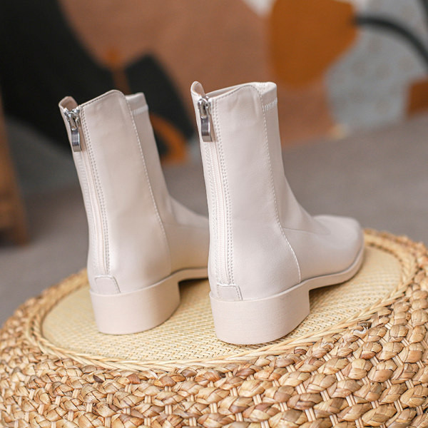 Naiste ühevärviliste kunstnahast saapade uus mudel