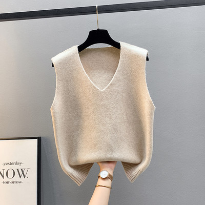 Kötött női mellény vékony kötésből, spitz nyakkivágással