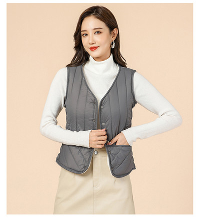 Alkalmi női mellény gombokkal és V-nyakkal