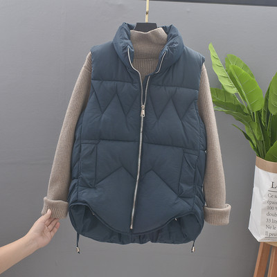 Aszimmetrikus női mellény steppelt hatással