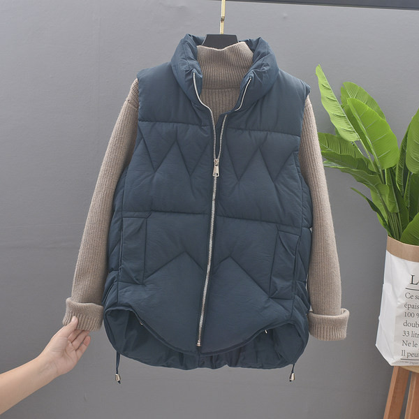 Aszimmetrikus női mellény steppelt hatással