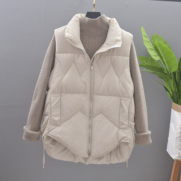 Aszimmetrikus női mellény steppelt hatással