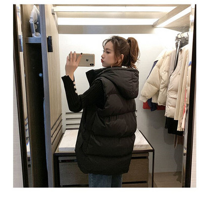 Naiste kapuutsi ja nööpidega vest