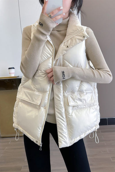 Meleg női mellény nagy zsebekkel és nyakkendőkkel