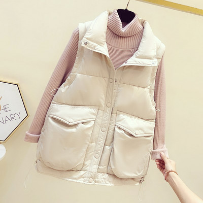 Téli mellény zsebekkel és gombokkal - nőknek