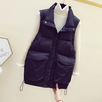 Téli mellény zsebekkel és gombokkal - nőknek