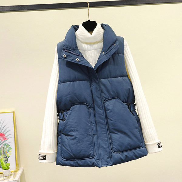 Γυναικείο χοντρό γιλέκο μεσαίου μήκους με μεγάλες τσέπες