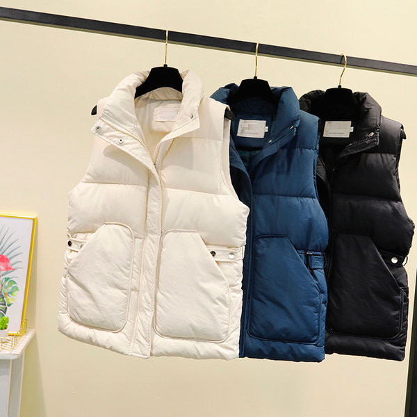 Γυναικείο χοντρό γιλέκο μεσαίου μήκους με μεγάλες τσέπες