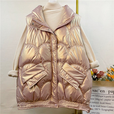 Lai taskutega ja läikiva efektiga naiste vesti mudel