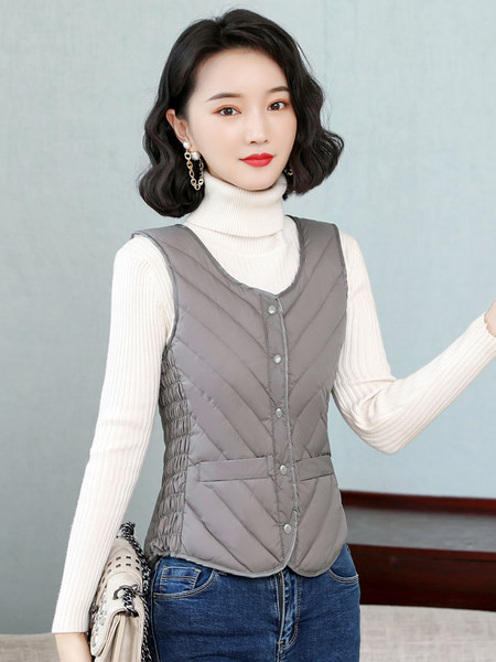 Női mellény meleg béléssel és gombokkal