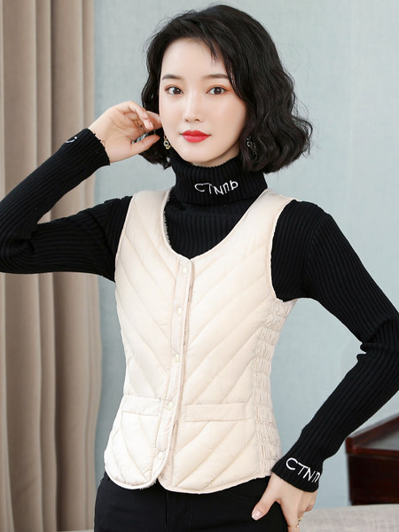 Női mellény meleg béléssel és gombokkal