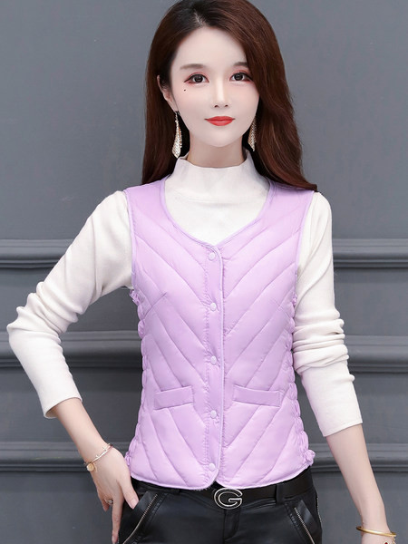 Női mellény meleg béléssel és gombokkal