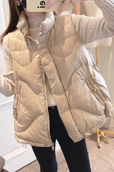 Női mellény széles modell cipzárral