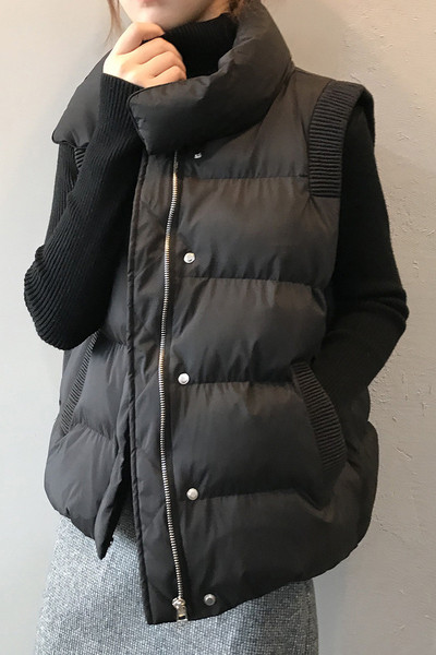 Široki prsluk s džepovima i elastikom