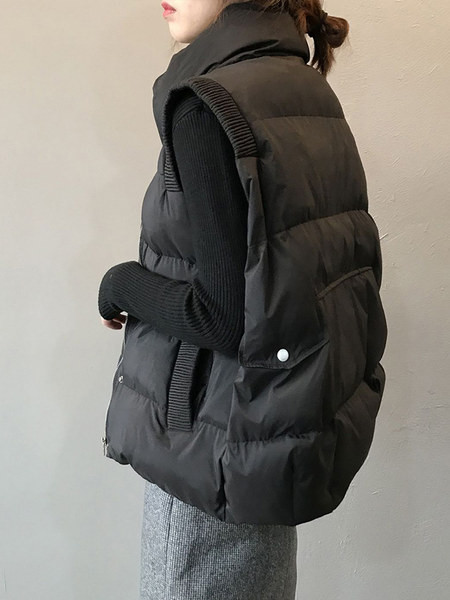 Široki prsluk s džepovima i elastikom