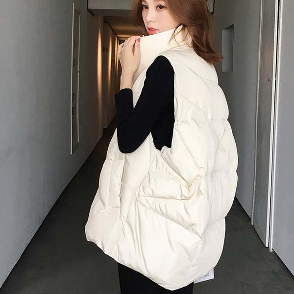 Φαρδύ μοντέλο γυναικείο γιλέκο με τσέπες σε δύο χρώματα