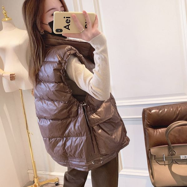 Őszi-téli mellény cipzárral és gombokkal