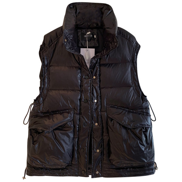 Őszi-téli mellény cipzárral és gombokkal