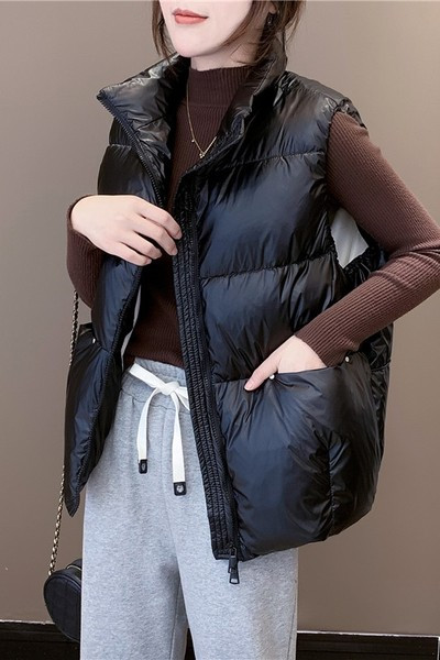 Széles őszi-téli mellény zsebekkel