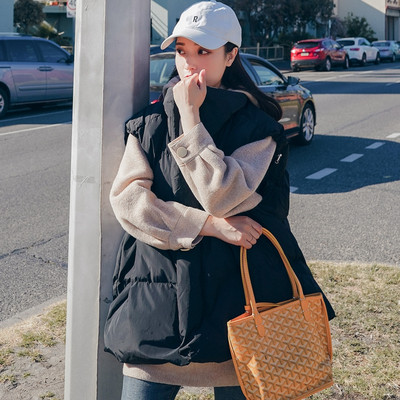 Široki model ženskog prsluka u dvije boje