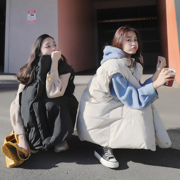 Široki model ženskog prsluka u dvije boje