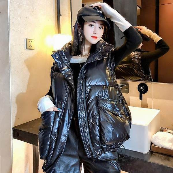 Női mellény széles modell zsebekkel