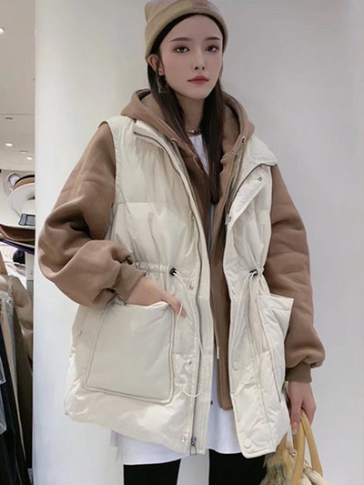 Női széles mellény nyakkendővel és nagy zsebekkel