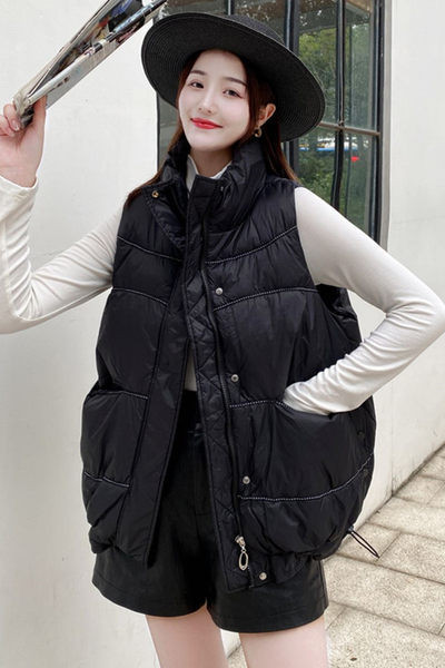 Lai nööpide ja lukuga naiste vesti mudel