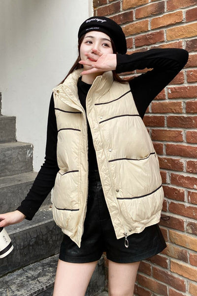 Lai nööpide ja lukuga naiste vesti mudel